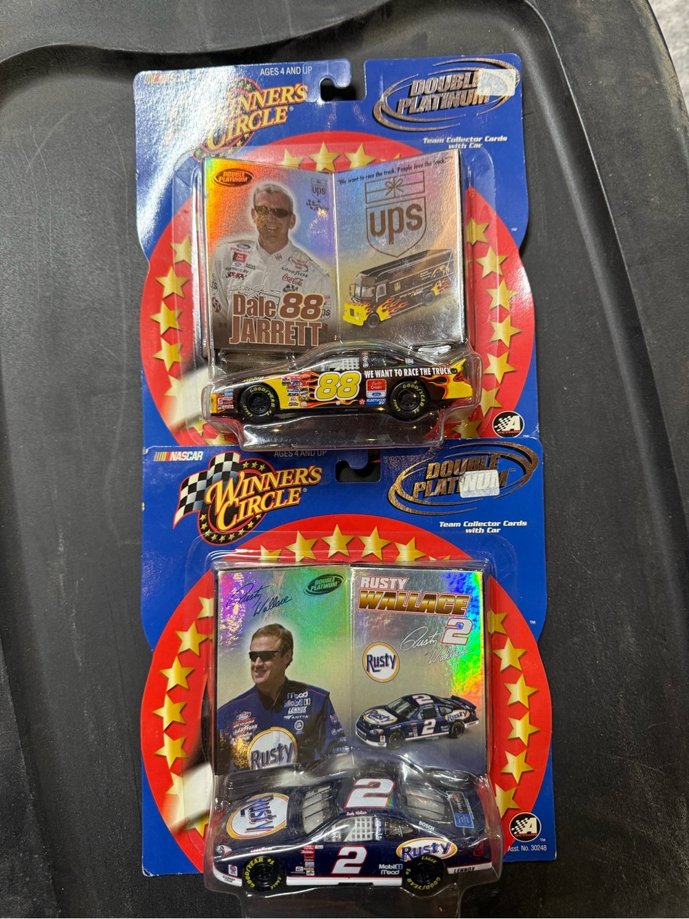 Set of 2, 1:43 scale NASCARs, still in packaging